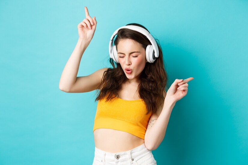 Woman Listening Music on Music Player